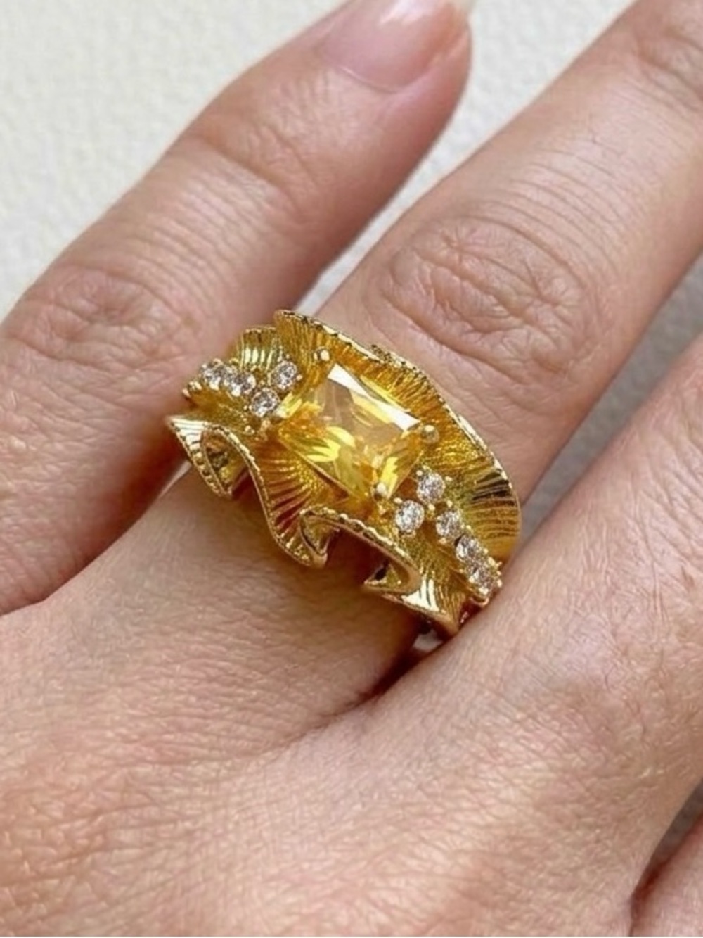 Elegant Gold and Yellow Gemstone Ring